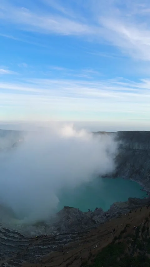 Ijen volcano - blue fire magic &amp; acidic crater lake - East Java Indonesia Stock Footage 314303050