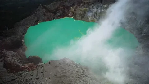 Ijen volcano crater Java bromo indonesia acidic blue lake hiking mountain drone Stock Footage 230274470