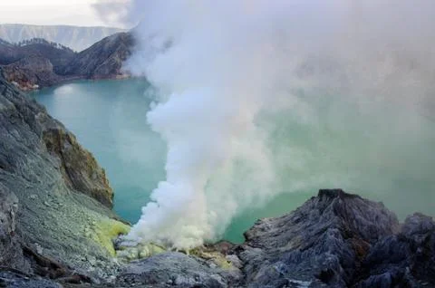 Ijen volcano in East Java in Indonesia. It's famous for sulfur mining and aci Stock Photos