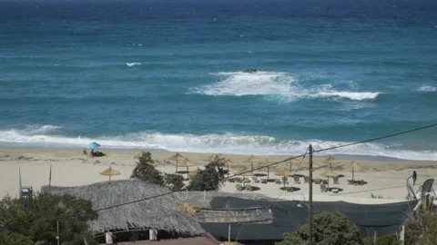 Ikaria beach with surf waves Video stock 144923710