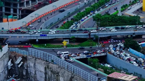 IKEA junction with underpass, overpass, traffic flow and high rise buildings Stock Footage 344167979