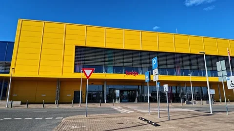 Ikea store exterior showing the main entrance, facade, and parking lot on a Stock-Footage 337791253