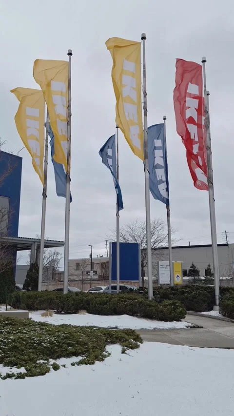Ikea store flags waving in the wind during winter Stock Footage 326168437