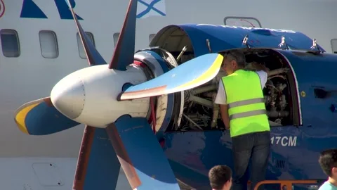 IL-114 - Russian twin-engine turboprop aircraft.  performs aerobatics. Stock Footage 135319022