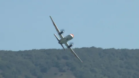 IL-114PL - Russian twin-engine turboprop aircraft.  performs aerobatics. Stock Footage 120497678