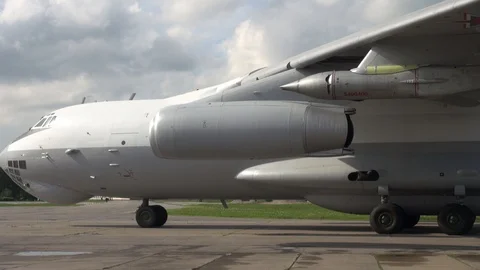 IL-78 tanker (NATO codification: Midas) moves towards unway. Close-up. Stock Footage 123905265