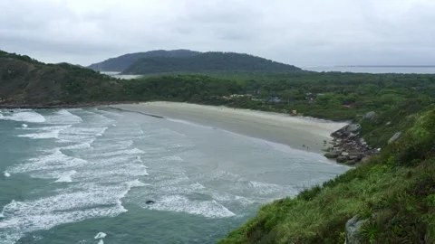 Ilha do Mel Bay View Brazil with Gentle Waves and Lush Green Coast Stockbeeldmateriaal 336450950