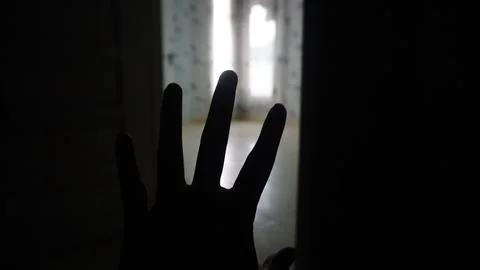 Ilhouette, hand, shadow, darkness, window, light, mystery, eerie, lonely, i.. Stock Photos