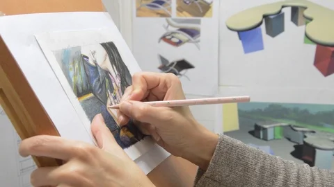 Ilistrator at work drawing Stock Footage 98780418