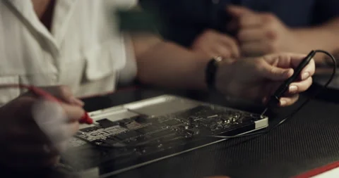 Ill be there if your computer needs repair. 4k video footage of a technician Stock Footage 201072087