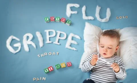 Ill boy lying in bed Stock Photos