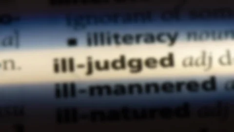 Ill judged word in a dictionary. Stock Footage 99560716