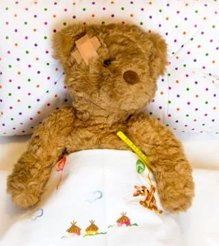Ill teddy bear Stock Photos