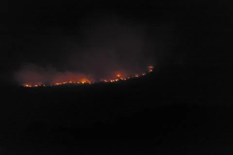 Illa de Arousa, Pontevedra, Spain. August 5, 2022: fire the mountains in Aros Stock Photos