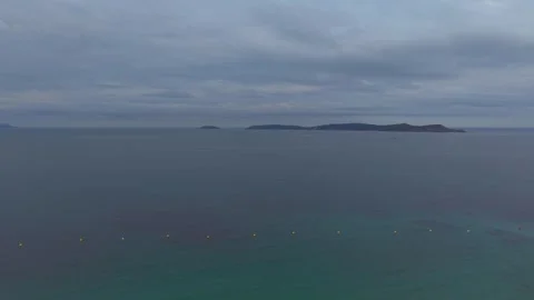 Illa de Ons on the Horizon Beyond a Buoy Line on Calm Water Galicia Spain Stock Footage 341430346