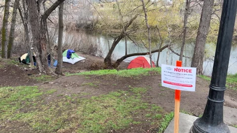 Illegal Camping on Clark Fork River in Missoula, Montana Stock Footage 242872025