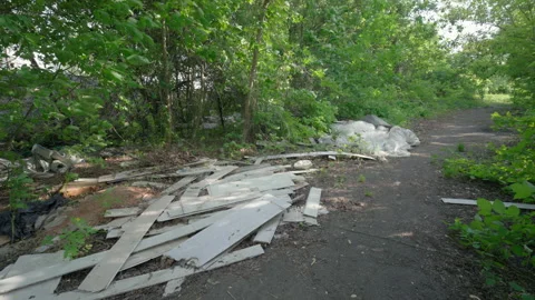 Illegal Dumping of Construction Waste on Forest Park Path — Slow Push-In Shot 스톡 동영상 337592644