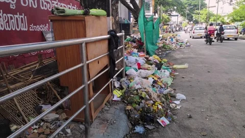 The illegal dumping of garbage and trash at the roadside by negligent city .. Stock Footage 244051847