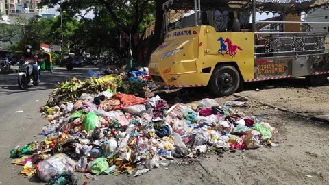 The illegal dumping of garbage and trash at the roadside by negligent city .. Stock Footage 244051848