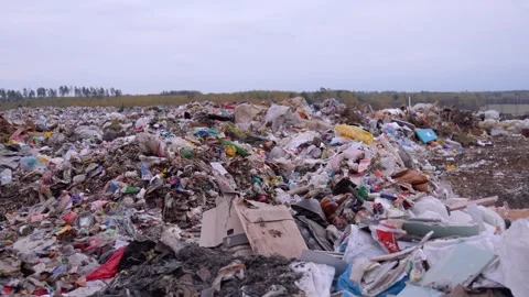 Illegal garbage dump polluting the environment Stock Footage 326148028
