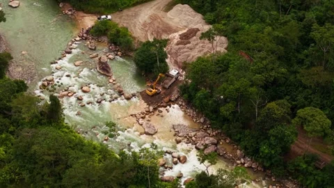 Illegal gold mining destroying amazon rainforest river in ecuador Stock Footage 346100233