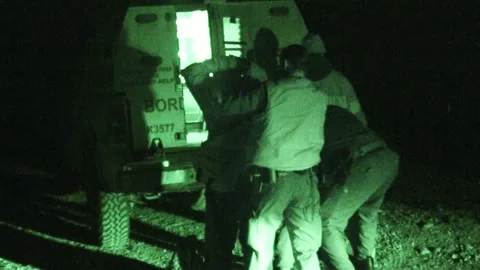 Illegal Migrants Get Pat-down by Border Patrol Agents Stock Footage 170578442