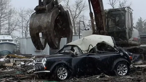 Illegal Mini automobile being crashed by excavator - 2014 Stock Footage 100599187