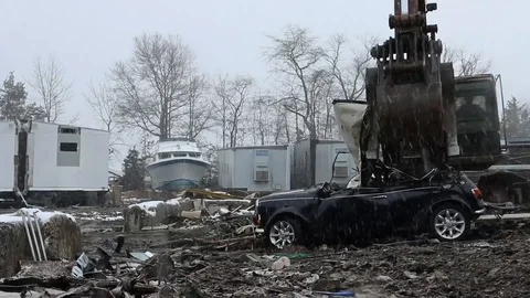 Illegal Mini automobile being crashed by excavator - 2014 Stock Footage 100599245