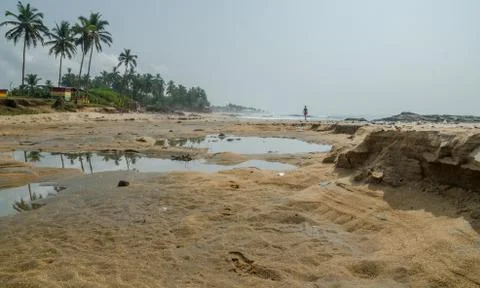 Illegal sand mining causing environmental damage at African beach Stock Photos