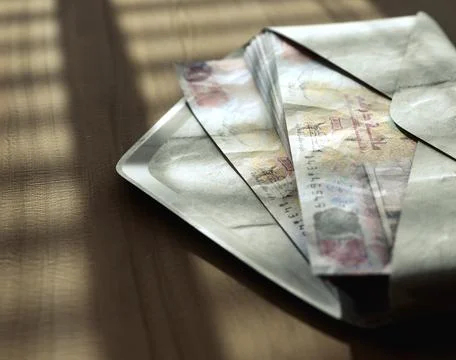 Illicit Dirham Banknotes In Envelope Stock Photos