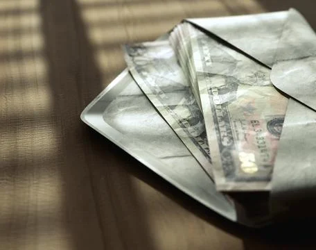 Illicit Dollar Banknotes In Envelope Stock Photos