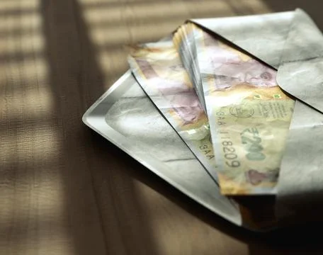 Illicit Rupee Banknotes In Envelope Stock Photos