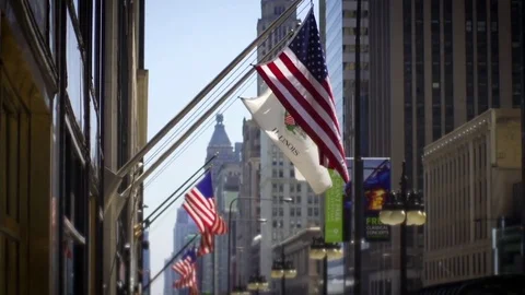 Illinois flag pan down to street chicago Stock Footage 78647650