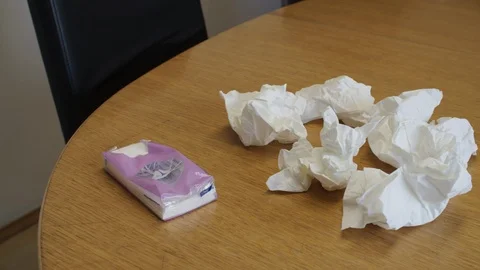 Illness: throwing a used tissue paper on the table 스톡 동영상 126653414