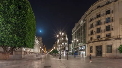 Illuminated Adriatica building on Avenida de la Constitucion at night, Seville Vidéo 305791877