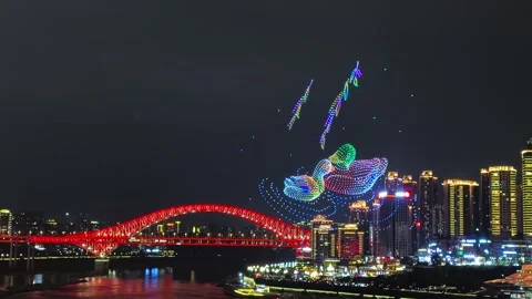 Illuminated Aerial Patterns Over The Night Sky Of Chongqing, China. Aerial Wide Stock Footage 337015427