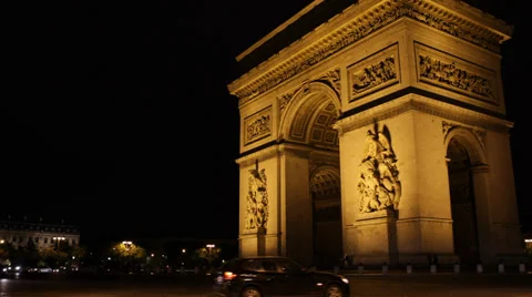 Illuminated Arc de Triomphe Triumphal Arch Paris France Car Traffic Moving Night Video stock 31916590