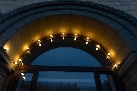 The illuminated arch in the evening Stock Photos