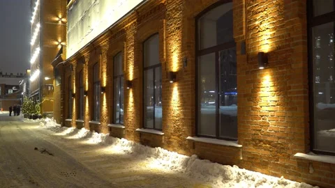 Illuminated brick facade night view Stock Footage 146815665