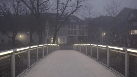 Illuminated bridge in the fog Stock Footage 264592086