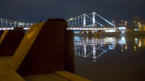Illuminated bridge over the river Stock Footage 112399471
