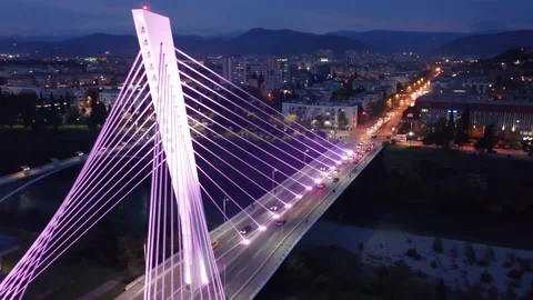 Illuminated cable-stayed bridge at night. Aerial view of Podgorica Montenegro. Stock Footage 142166685