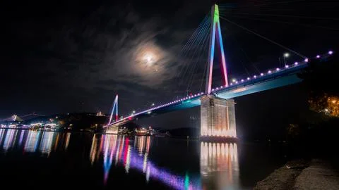 Illuminated Cable Stayed Bridge Over Water at Night Stock Photos