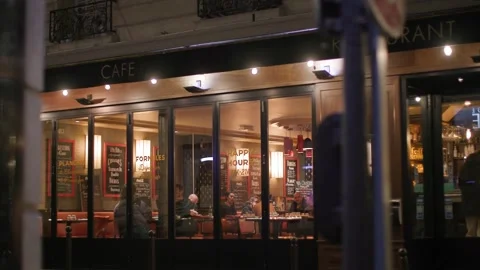 Illuminated caf at night in Paris Stock Footage 245722225
