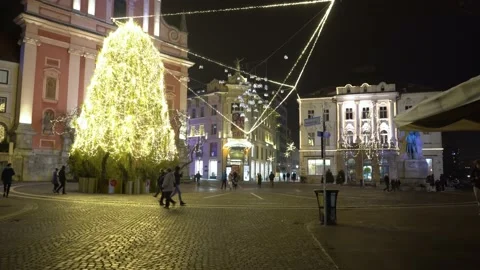 Illuminated Christmas tree on Preseren square in Ljubljana city Stock Footage 168984532