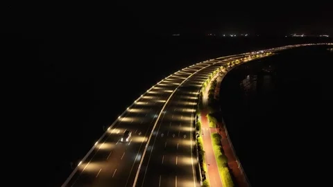 Illuminated Cinta Costera Highway Curving Through Panama City Night Lights Видео 339709588