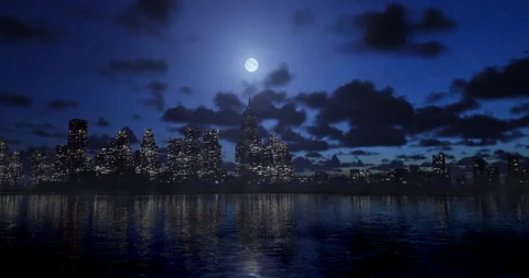 Illuminated city at night with clouds moving on sky background Stock-Footage 247408993