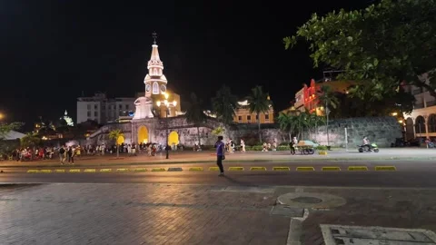 Illuminated Clock Tower and Public Square at Night in Cartagena Stock Footage 340283271