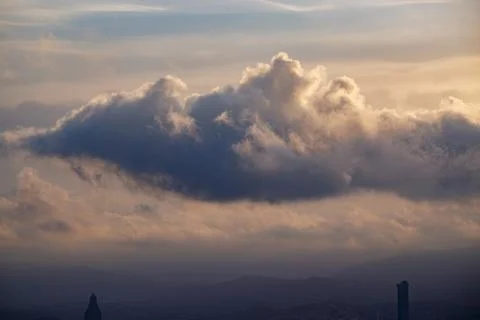 Illuminated Cloud Mass at Dusk Stock Photos