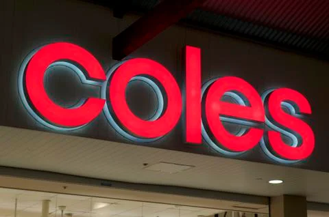 Illuminated Coles sign Stock Photos